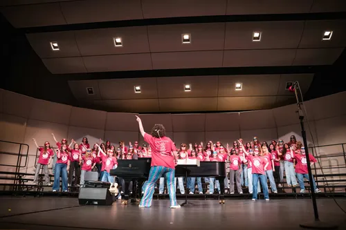 Full choir and conductor filling the stage